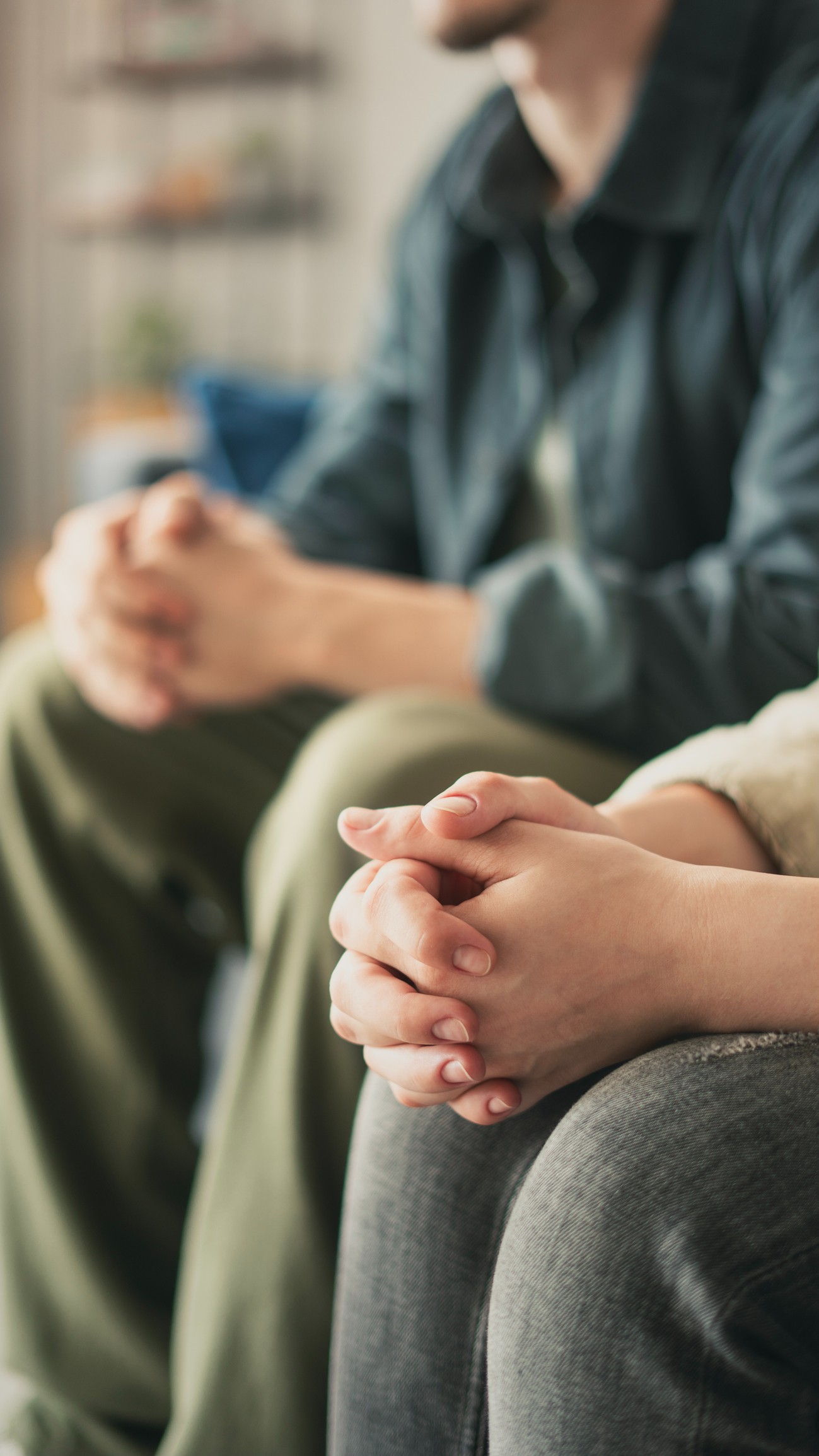 A couple working through a disagreement during a guided counseling session